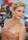 Kate Hudson in long gold dress at The Reluctant Fundamentalist Premiere